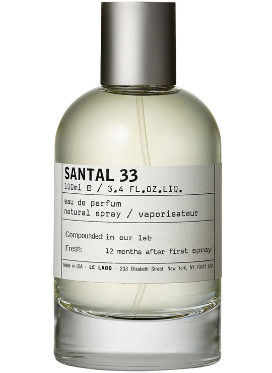Decant de Santal 33 de Le Labo, presentación elegante con frasco de vidrio y etiqueta minimalista, ideal para fragancia.