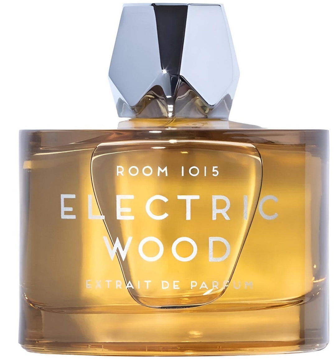 Decant eléctrico de madera de la marca ROOM 1015, muestra un dispositivo elegante para aromatizar espacios.